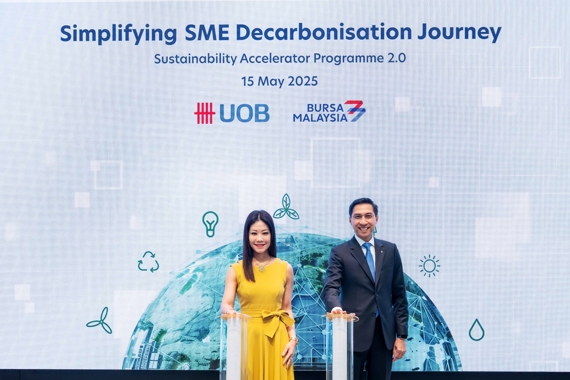 Ms Ng Wei Wei CEO UOB Malaysia and Dato Fadl Mohamed CEO Bursa Malaysia launching the collaboration to simplify SMEs decarbonisation journey